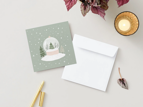 Carte de souhaits de Noël fait au Québec avec motif de boule à neige enneigée et flocons - Veille sur toi