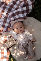 Bébé Gordis - Rachel avec blouse fleurie, pantalon et boucle - Paola Reina