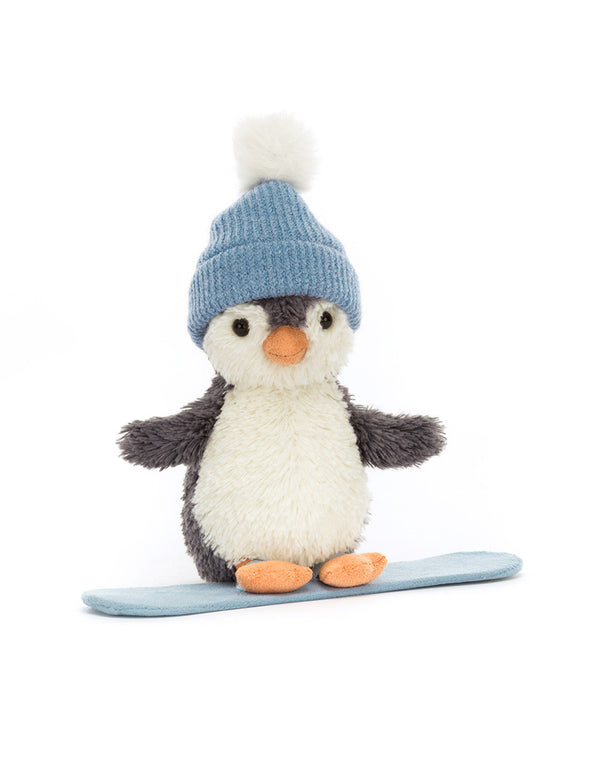 Peluche ultra douce de Peanut le pingouin avec sa planche à neige - Jellycat | Veille sur toi