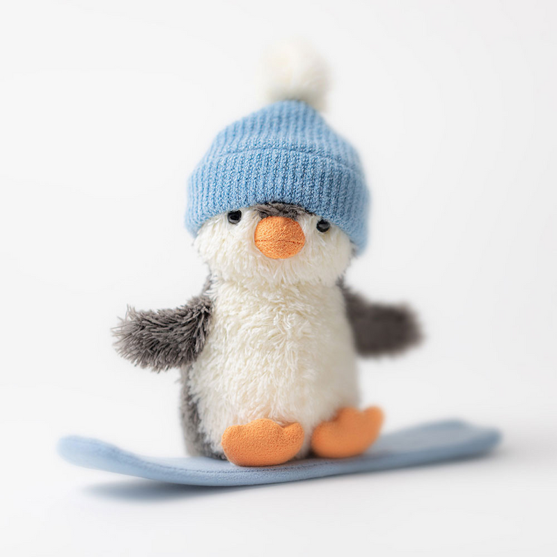Peluche - Pingouin Peanut en planche à neige - Jellycat