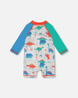 Deux par Deux Baby And Toddler One-Piece Long Sleeve Rashguard Grey Baby Dinosaur Print vendu par Veille sur toi