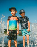 Deux par Deux Swim Trunks Black Dinosaur Print vendu par Veille sur toi