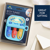Itzy Ritzy Canada 403802018 *NEW* Bitzy Tunes™ Light-up Interactive Piano Toy - Sardines vendu par Veille sur toi