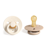 Itzy Ritzy NRP843206 Ensemble 2 suces avec tétines en caoutchouc naturel Itzy Soother™ - Itzy Ritzy Coconut + Toast - 0-6 mois vendu par Veille sur toi