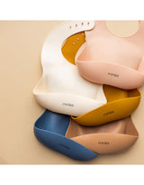 Minika ⚜ Bavoir en silicone - Minika vendu par Veille sur toi